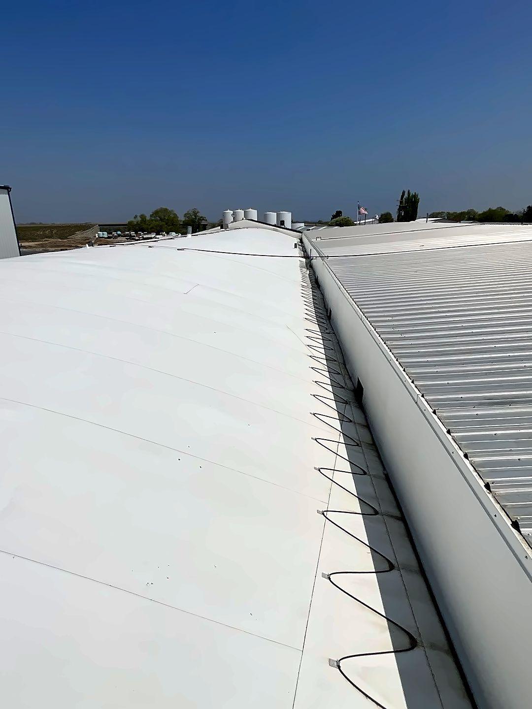Coated valley running along a metal roof at Driscoll Potatoes, American Falls, Idaho